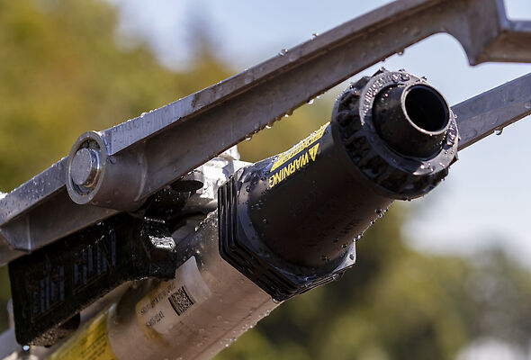 Plastic nozzles on Nelson Big Gun sprinkler